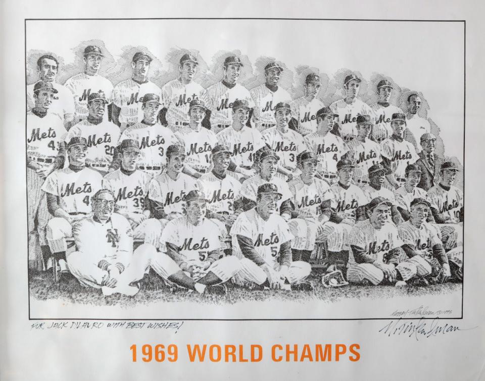 Some of the artwork of the 1969 World Series championship team that Jack DiLauro displays at his home in Malvern.