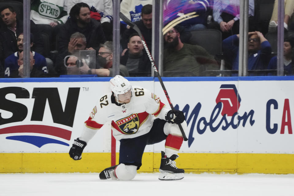 Florida Panthers defenseman Brandon Montour celebrates his overtime game winning goal against the Toronto Maple Leafs in an NHL hockey game in Toronto on Wednesday, March 29, 2023. (Nathan Denette/The Canadian Press via AP)