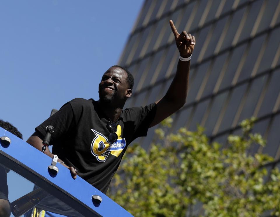 <p>Golden State Warriors’ Draymond Green waves at fans during a parade and rally in honor of the Warriors, Thursday, June 15, 2017, in Oakland, Calif., to celebrate the team’s NBA basketball championship. (AP Photo/Marcio Jose Sanchez) </p>