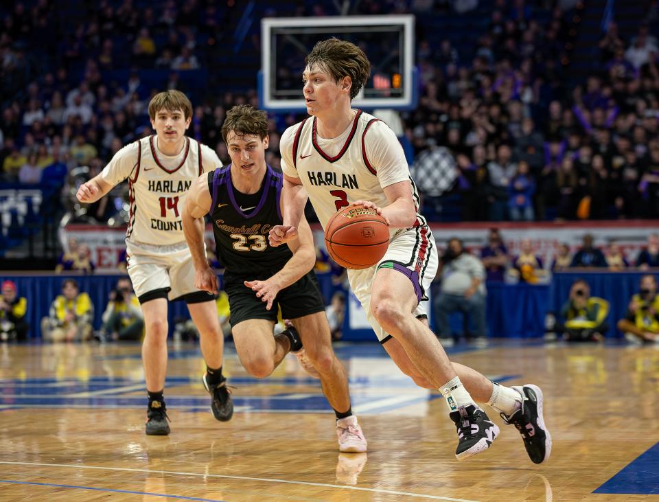 Harlan County's Trent Noah (2) drove to the basket in overtime as the Harlan County Black Bears defeated the Campbell County Camels 85-71 in quarterfinal action at the 2024 UK Healthcare KHSAA Boys' Sweet 16 in Lexington. March 22, 2024