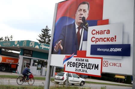 Milorad Dodik, President of Republika Srpska is pictured on an election poster calling for votes for a referendum on their Statehood Day in Prnjavor, Bosnia and Herzegovina, September 21, 2016. Picture taken September 21, 2016. REUTERS/Dado Ruvic