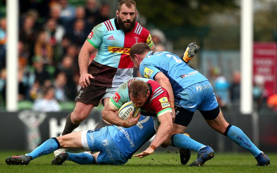 Chris Robshaw is tackled by the resolute London Irish defence - Getty Images Europe