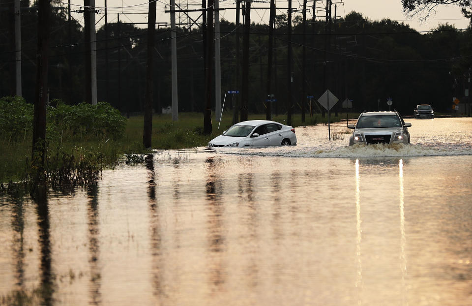 A truck drives through high water on a street as Orange, Texas, slowly moves toward recovery almost a week after the devastation of Hurricane Harvey on Sept. 6, 2017. (Photo: Spencer Platt via Getty Images)