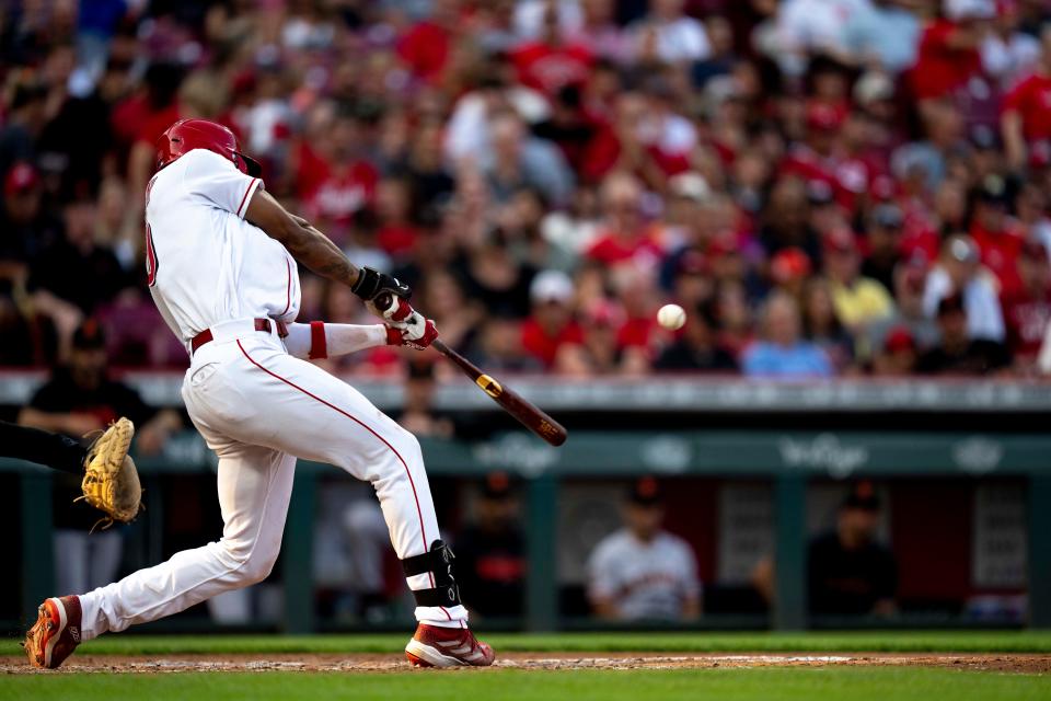 Cincinnati Reds left fielder Will Benson (30) hits a 3-run home run in the third inning of the baseball game between the Cincinnati Reds and San Francisco Giants at Great American Ball Park in Cincinnati on Wednesday, July 19, 2023.
