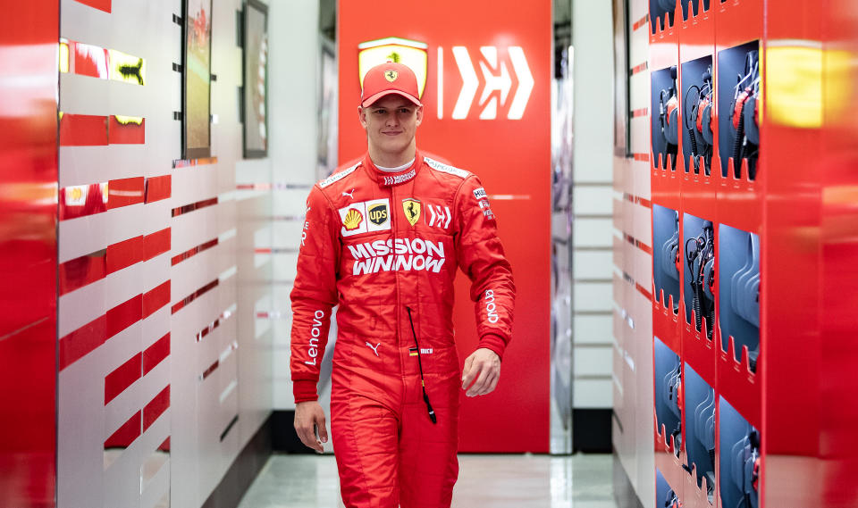 BAHRAIN, BAHRAIN - APRIL 02: Mick Schumacher of Germany and Scuderia Ferrari SF90 walks out of the garage during F1 testing in Bahrain at Bahrain International Circuit on April 02, 2019 in Bahrain, Bahrain. (Photo by Lars Baron/Getty Images)