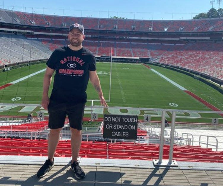 The British Bulldawg, Chris Biggs, got a Sanford Stadium tour on Thursday. Biggs is a passionate Georgia football fan who will attend his first game on Saturday after making the trip from Edinburgh, Scotland.