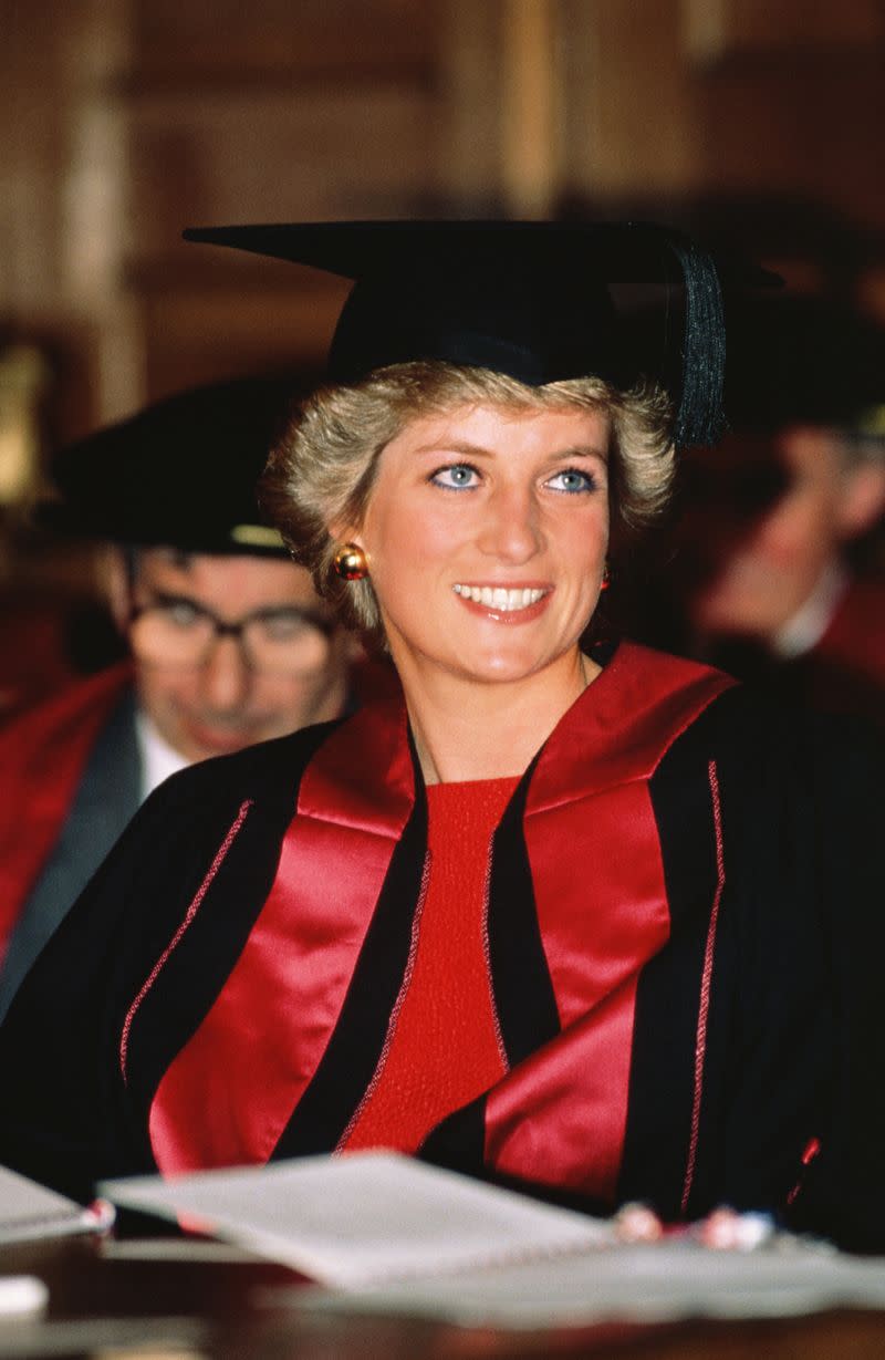 <p> Attending an official visit at the Royal College Surgeons, where she dressed the part in a student&apos;s traditional cap and gown. </p>