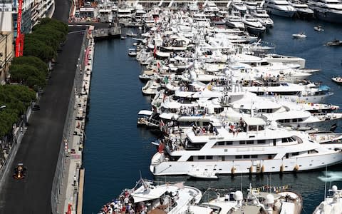 Daniel Ricciardo roars round the Monaco circuit - Credit: getty images