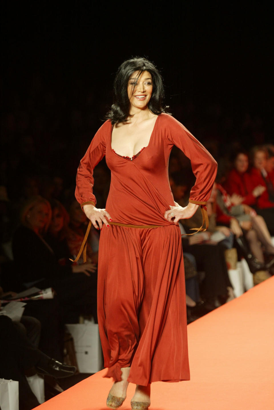 Shoreh Aghdashloo catwalks in a fashion show