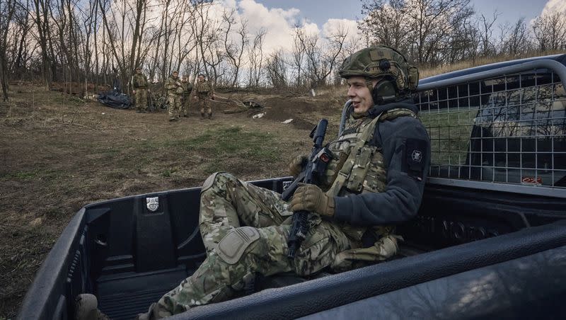 Ukrainian soldiers of the 28th Brigade guard their position close to Bakhmut, Donetsk region, Ukraine, Monday, March 27, 2023.