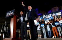 Democratic U.S. presidential candidate Senator Bernie Sanders takes the stage with U.S. Representative Jesus Garcia (D-IL) at a campaign rally in Las Vegas