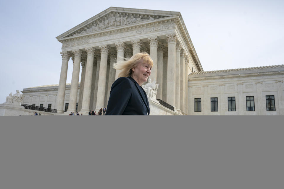 Attorney Sheri Johnson leaves the Supreme Court after challenging a Mississippi prosecutor's decision to keep African-Americans off the jury in the trial of Curtis Flowers, a black death row inmate who has been tried six times for murder, in Washington, Wednesday, March 20, 2019. (AP Photo/J. Scott Applewhite)