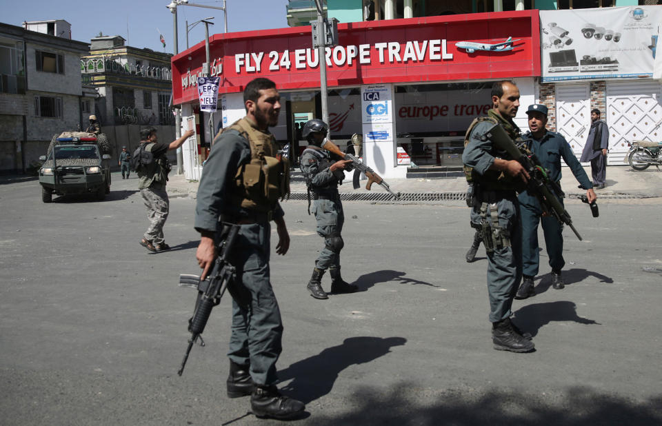 <p>Security forces stand near the site of a suicide attack in Kabul, Afghanistan, Wednesday, May 31, 2017. (AP Photos/Massoud Hossaini) </p>