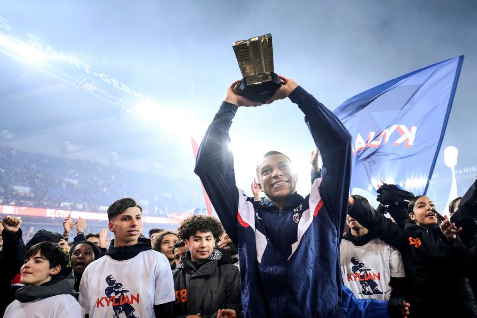 Kylian Mbappe celebrates after becoming Paris St Germain’s all-time top scorer (Franck Fife/AP) (AP)