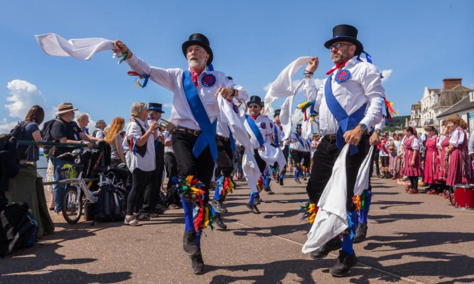 Morris men on the seafront at Sidmouth during the folk festival.