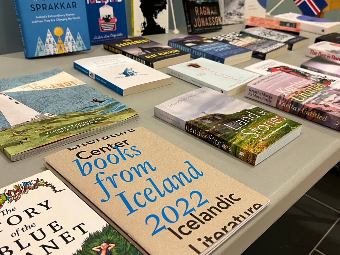 Iceland and Canada are celebrating 75 years of diplomatic relations. To commemorate, the two countries are participating in a book exchange. Representatives of Iceland gifted books to the Whitehorse Public Library on Wed. June 29.  (Sissi De Flaviis/CBC - image credit)