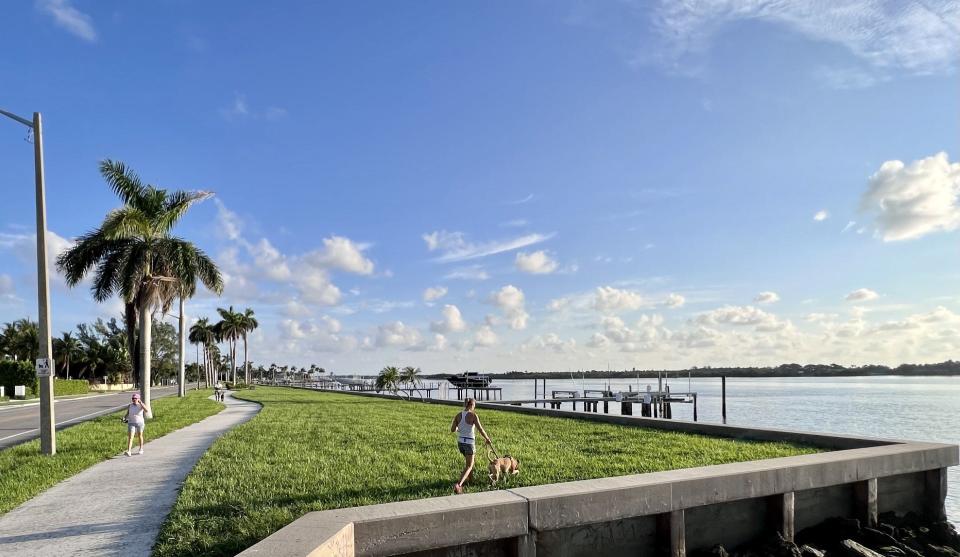 Along South Flagler Drive, the area to the right of the sidewalk is private property but the city has maintained the land and the seawall since Flagler Drive was constructed decades ago. A homeowner sought to put a fence up that would block people from using it but was denied.