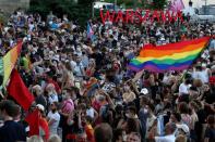 People take part in a rally in support of the LGBT community in Warsaw
