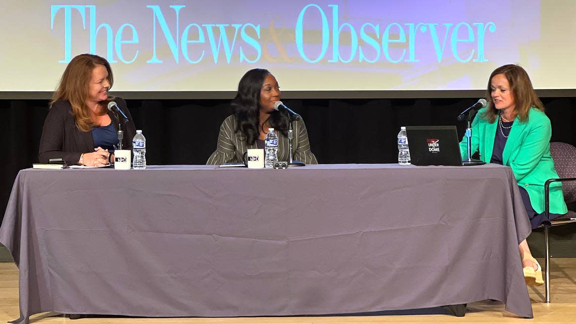 From left to right, Republican Sen. Vickie Sawyer and Democratic Sen. Natalie Murdock talk to News & Observer Capitol Bureau Chief Dawn Vaughan during a live recording of the Under the Dome podcast in downtown Raleigh on April 30, 2024.