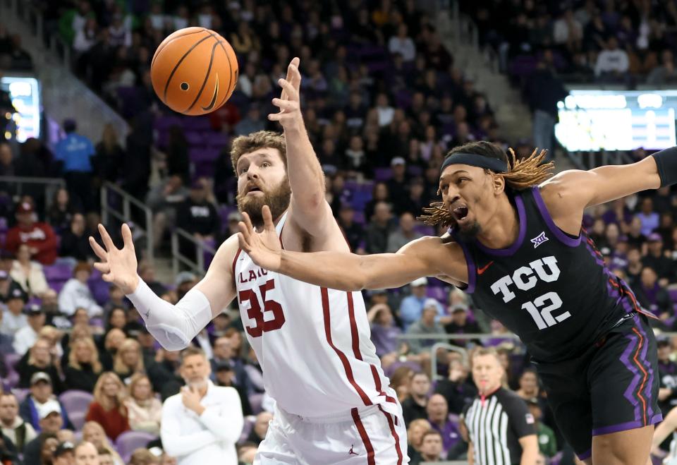 Jan 24, 2023; Fort Worth, Texas, USA;  Oklahoma Sooners forward Tanner Groves (35) and TCU Horned Frogs forward Xavier Cork (12) chase a loose ball during the first half at Ed and Rae Schollmaier Arena. Mandatory Credit: Kevin Jairaj-USA TODAY Sports