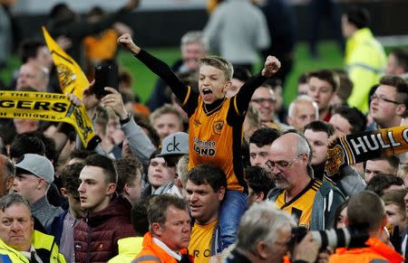 Britain Football Soccer - Hull City v Derby County - Sky Bet Football League Championship Play-Off Semi Final Second Leg - The Kingston Communications Stadium - 17/5/16 Hull fans celebrate on the pitch after reaching the Sky Bet Football League Championship Play-Off Final Action Images via Reuters / Craig Brough