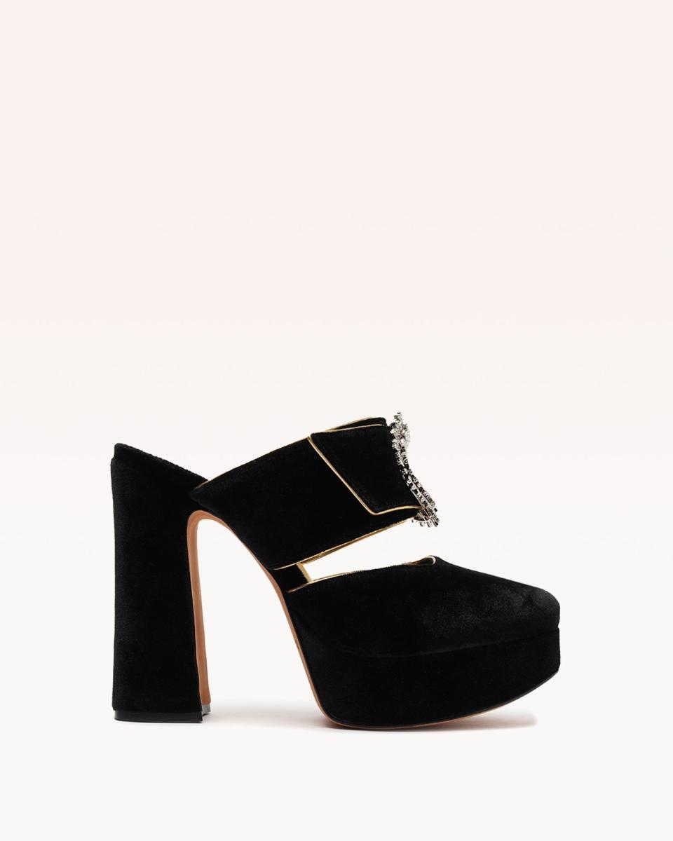 <p>alexandrebirman.com</p><p><strong>$795.00</strong></p><p>2022 brought the oh-so happy return of the mule. Here, the Alexandre Birman take on the silhouette, complete with lush velvet, gold trim, and a glam crystal buckle.</p>