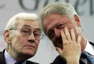 FILE PHOTO: U.S PRESIDENT CLINTON TALKS TO FIRST MININSTER MALLON IN BELFAST.