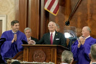 Gov. Henry McMaster smiles and looks to the balcony after introducing his wife, first lady Peggy McMaster, at the beginning of his State of the State address on Wednesday, Jan. 25, 2023, in Columbia, S.C. (AP Photo/Meg Kinnard)