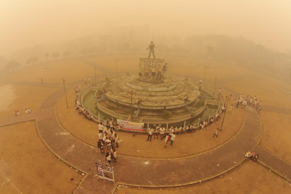 Palangkaraya – The most polluted place on earth! This photo was taken on October 4th, 2015 when my friends and I did a campaign called “Kalteng with Love” where we gave free masks, milk and vitamin for the people in the city of Palangkaraya, Central Kalimantan, Indonesia. Thick smoke was hovering over where we live. The particulate meter that day showed that the air was so poluted and reached over 2000 psi. The smoke was caused by the fires in Borneo peatlands that was started from the end of July. For almost three months the people in Borneo had to breathe such toxicating air. There are lots of people who suffered from respiratory problems. Schools off. Flights could not operate. Economic system became paralyzed. Borneo is known as the lungs of the world and the fifth largest greenhouse gas emitter in the world, and these fires are not helping. We were even labelled as the most polluted place on earth. Through this photo, I would like to raise the world’s awareness that this matter is a huge problem for all of us. This challenge is addressed not only to people in Borneo and Indonesia, but also to the entire world. Could you imagine if all of the forests in Borneo disappear and there is limitied source of oxygen left for over 7 billion people? 