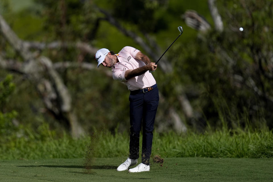 Max Homa hits from the fourth fairway during the first round of The Sentry golf event, Thursday, Jan. 4, 2024, at Kapalua Plantation Course in Kapalua, Hawaii. (AP Photo/Matt York)