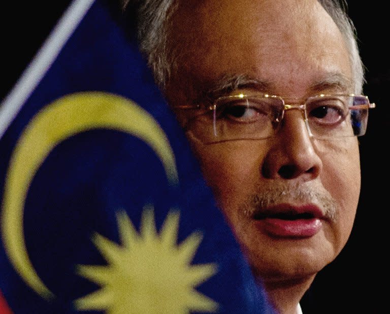 Malaysian Prime Minister Najib Razak looks on during a press conference in Kuala Lumpur, on March 19, 2013. Razak has dissolved parliament in preparation for a general election seen as the toughest challenge yet for the ruling coalition after 56 years in power