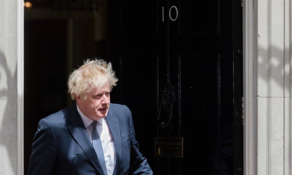 Boris Johnson emerges out of 10 Downing Street