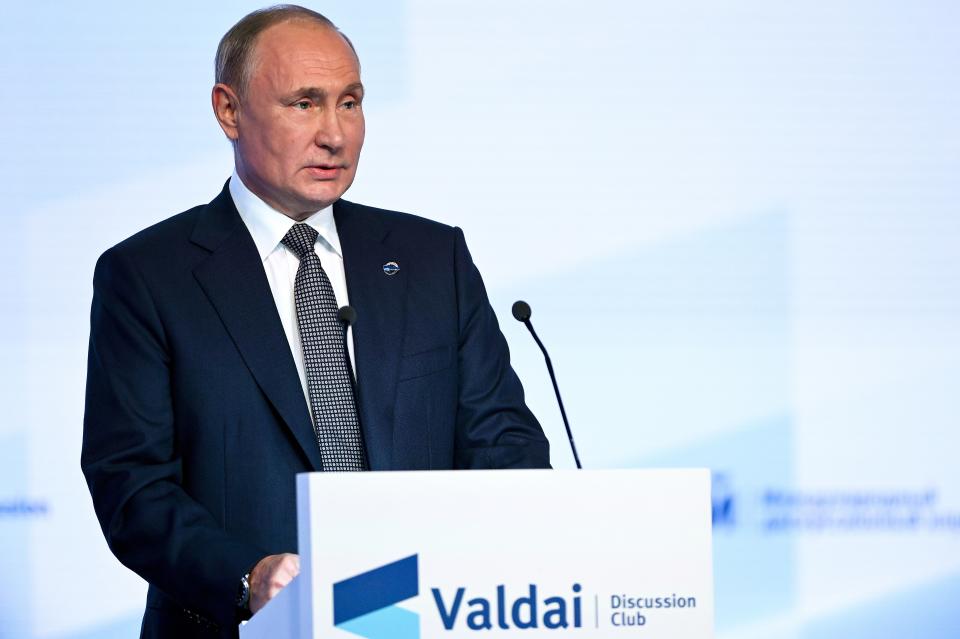 Russian President Vladimir Putin attends the annual meeting of the Valdai Discussion Club in the Black Sea resort of Sochi, Russia, Thursday, Oct. 21, 2021. President Vladimir Putin has voiced consternation about Russians' hesitancy to get vaccinated and urged them to get the shots, adding: "Why wait for the illness and its grave consequences?" (Maksim Blinov, Sputnik, Kremlin Pool Photo via AP)