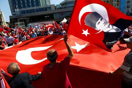 Supporters of various political parties gather in Istanbul's Taksim Square and wave Turkey's national flags during the Republic and Democracy Rally organised by main opposition Republican People's Party (CHP), Turkey, July 24, 2016. REUTERS/Osman Orsal