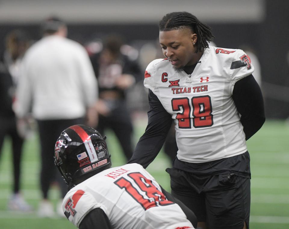 Tahj Brooks (28) has rushed for 3,052 yards and 28 touchdowns in his first four years as a Texas Tech running back. Brooks appears to be the Red Raider with the best chance to be drafted next year.