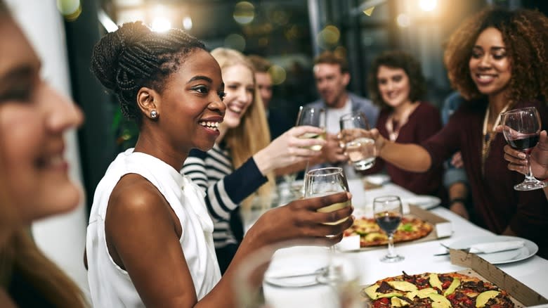 friends drinking wine at table