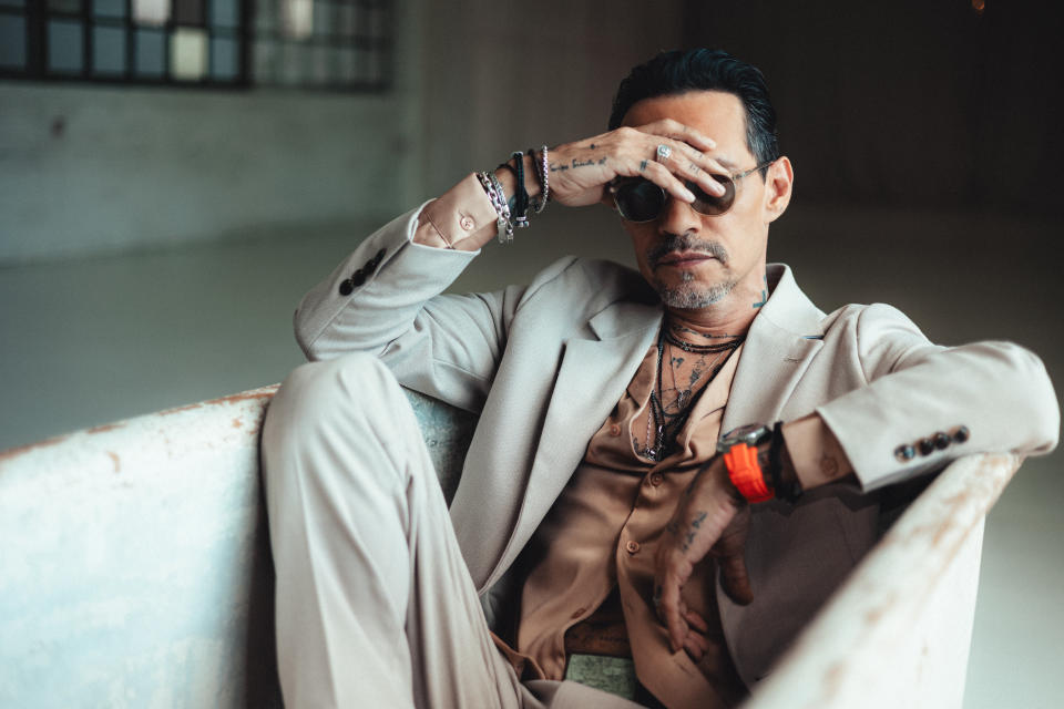 Marc Anthony wearing the Maquina’s Men’s style.