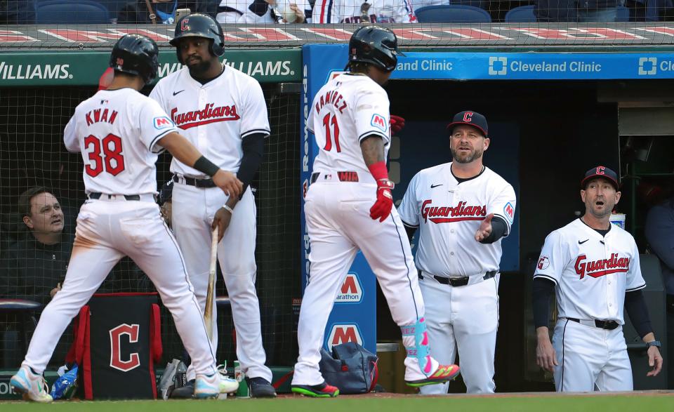 Guardians manager Stephen Vogt congratulates José Ramírez (11) after his two-run homer during the fifth inning of the home opener against the Chicago White Sox, Monday, April 8, 2024.