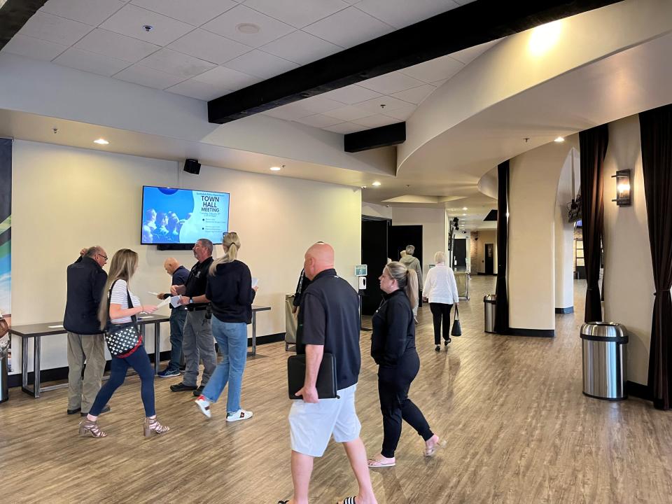 Crowds enter the main hall for Highlands Church, which hosted Scottsdale police's town hall meeting for recent dinnertime burglaries on Feb. 27, 2024.