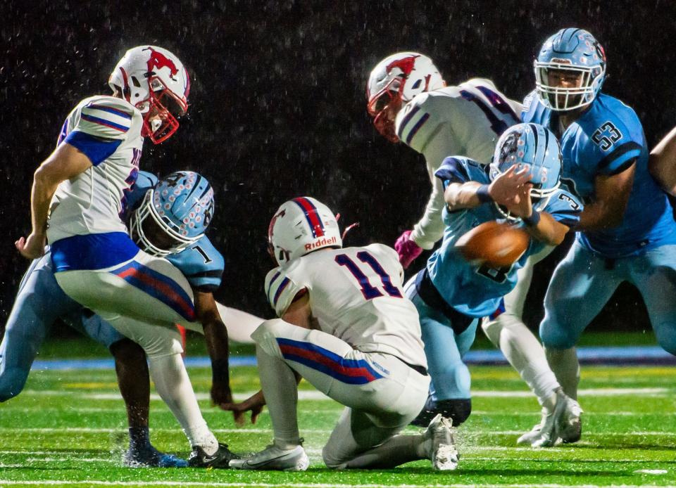 Central Valley's Rylan Jeter blocks a Laurel Highlands field goal attempt in the final seconds of the second quarter of their WPIAL playoff game Friday at Central Valley High School. [Lucy Schaly/For BCT]
