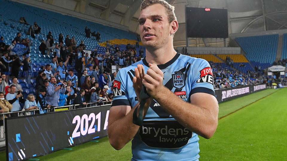 Tom Trbojevic applauds fans of the NSW Blues after a State of Origin match in 2021.