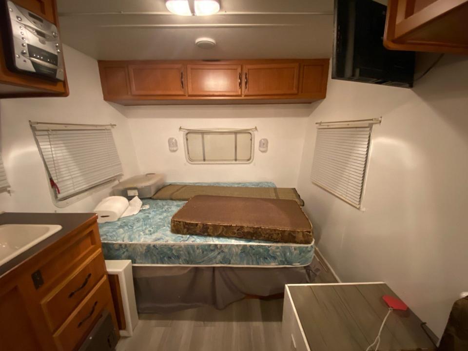 The inside of the camper when the couple first bought it.