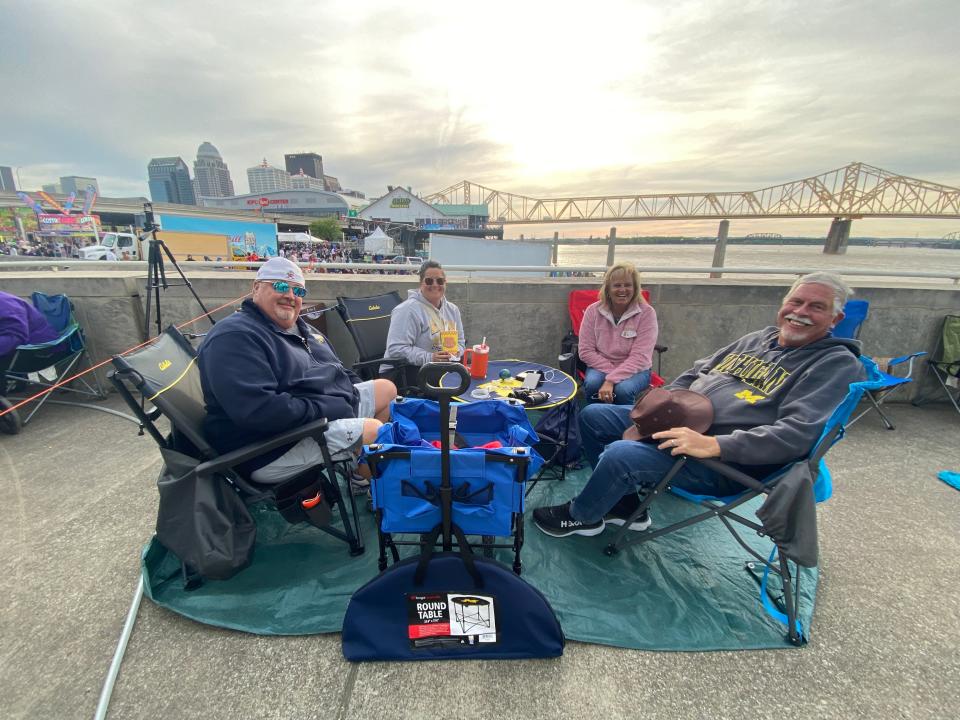 Married couple Larry and MaryLou Grindatti, of Indiana, accompanied by couple Stacy and Jim Kelley, of Georgia enjoy the sights of Thunder Over Louisville on Saturday, April 20, 2024.