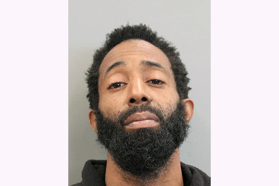 This booking photo provided by the Houston Police Department shows Tony Earls on Tuesday, Feb. 15, 2022. Houston police say Earls, who had been robbed at an ATM on Monday evening, Feb. 14, opened fire in an attempt to stop his attacker but instead shot a 9-year-old girl in a truck driving nearby. The girl later died at a hospital. (Houston Police Department via AP)