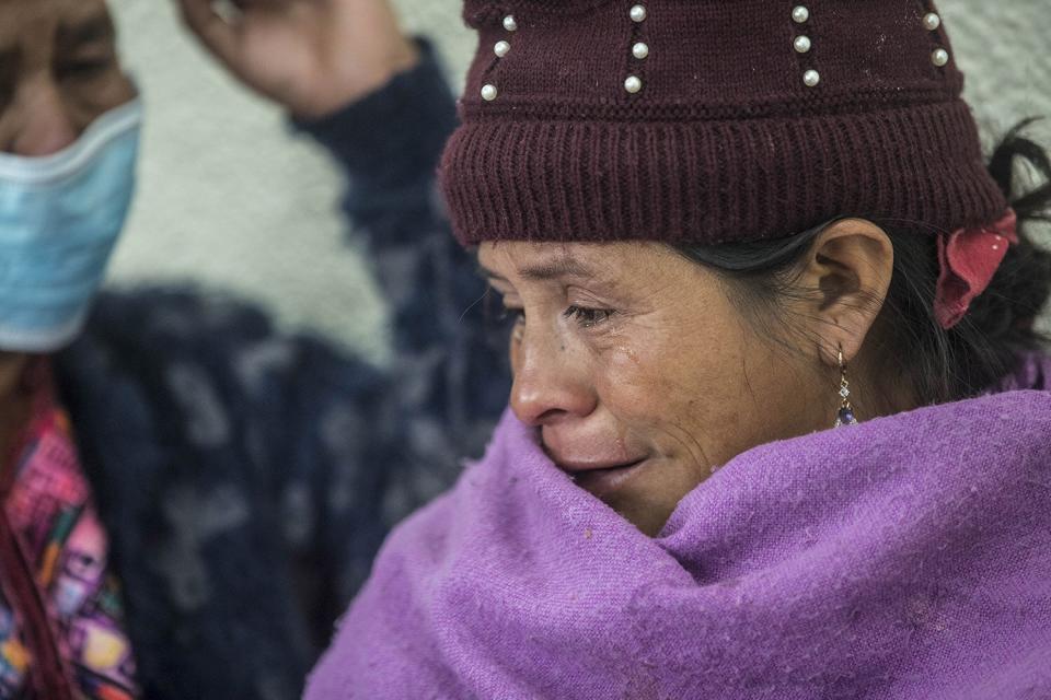 Mandatory Credit: Photo by Esteban Biba/EPA-EFE/Shutterstock (13013187a) Magdalena Tepaz (R) and Maria Sipac (not pictured), mothers of migrants who died in the container in San Antonio, Texas, United States, cry outside the Foreign Ministry in Guatemala City, Guatemala, 30 June 2022. Maria Sipac, mother of Pascual Guachiac and Magdalena Tepaz, mother of Wilmer Tulul, both 13-year-old migrants who died in a container in San Antonio, Texas, arrived at the Guatemalan Foreign Ministry to do a DNA test and recover the bodies of the minors to bury them in their native Nahuala, Solola. 53 migrants died due to suffocation from being locked in the container where human traffickers left them abandoned and locked up in San Antonio, Texas, USA on 28 June 2022. Mothers of deceased migrants in San Antonio Texas claim their bodies in the Guatemalan Foreign Ministry, Guatemala City - 30 Jun 2022