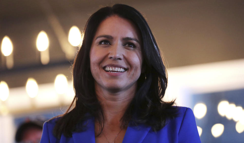 Presidential hopeful Rep. Tulsi Gabbard smiles during a campaign stop at a brewery in Peterborough, New Hampshire, on March 22. (Photo: Charles Krupa/Associated Press)