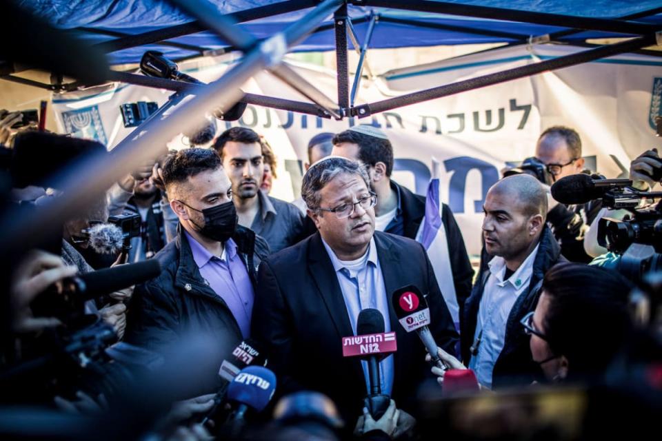 <div class="inline-image__caption"><p>Itamar Ben-Gvir speaks to media as he arrives in the neighborhood of Sheikh Jarrah to open his parliamentary office in between the Jewish and the Muslim houses.</p></div> <div class="inline-image__credit">Ilia Yefimovich/picture alliance via Getty</div>