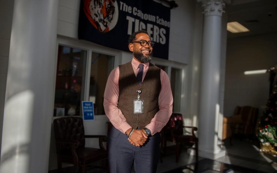 Principal Nicholas Townsend poses for a photo at Calhoun High School in Letohatchee, Ala., on Wednesday, Dec. 7, 2022.