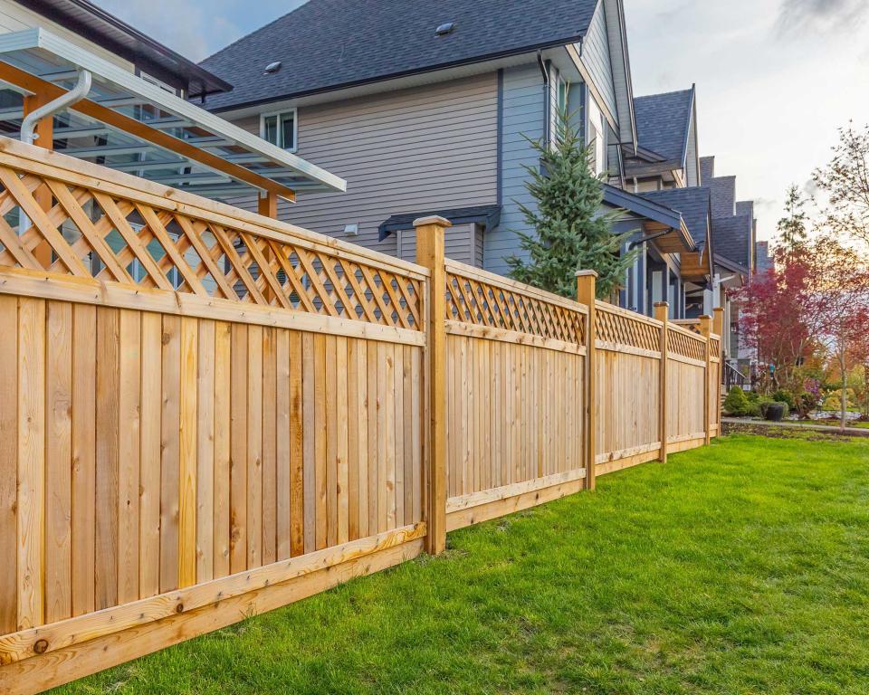 5. Boost the privacy levels with a tall wooden fence