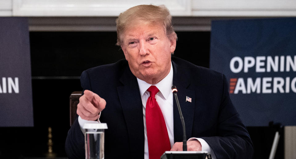 Donald Trump pointing and appearing angry during a meeting in Washington DC's White House on Friday.